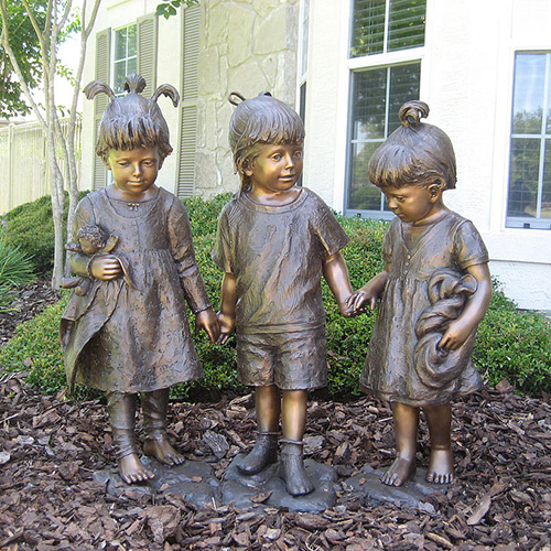 Three sisters walking bronze baby statues